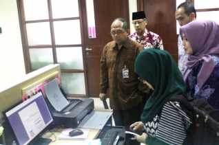 kunjungan kerja deputi bidang informasi dan data kpk ri pada dpmptsp provinsi riau
